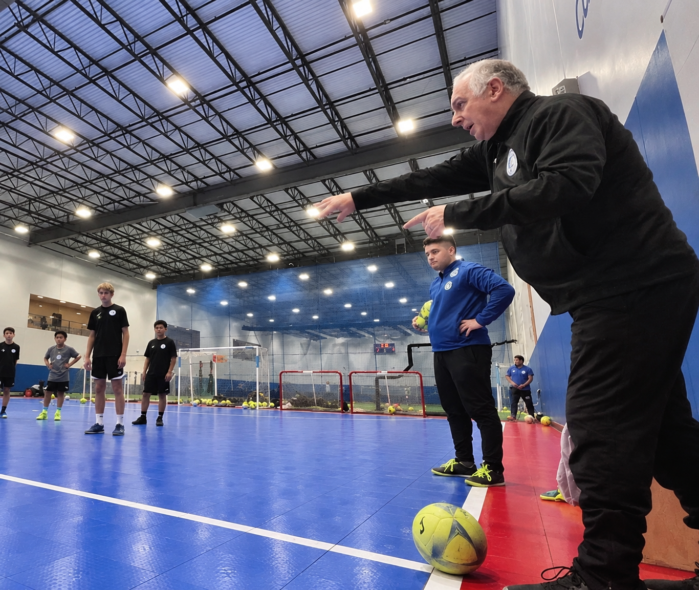 Coach Zego directing a futsal session
